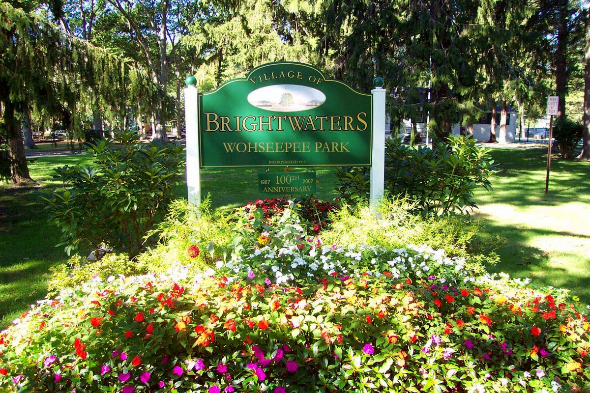 Wohseepee Park entrance sign and flower garden in Brightwaters, New York