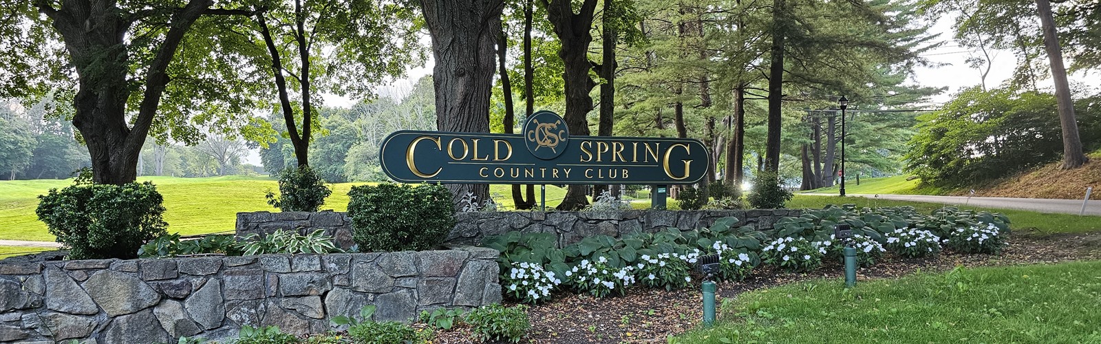 Cold Spring Country Club entrance sign and landscaped grounds in the Huntington area of Long Island